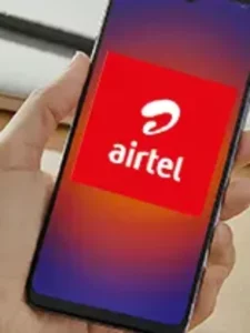 Airtel logo on mobile hand